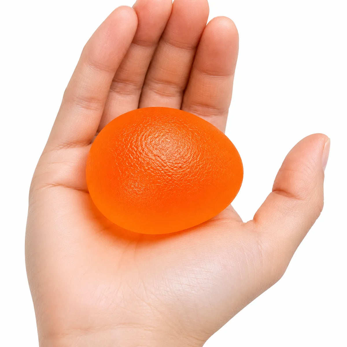 Handträningsboll i orange för daglig handträning och fingerstyrka.
