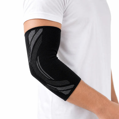 Armbågsstöd med lätt kompression och följsam passform för bekväm användning runt armbågen.
