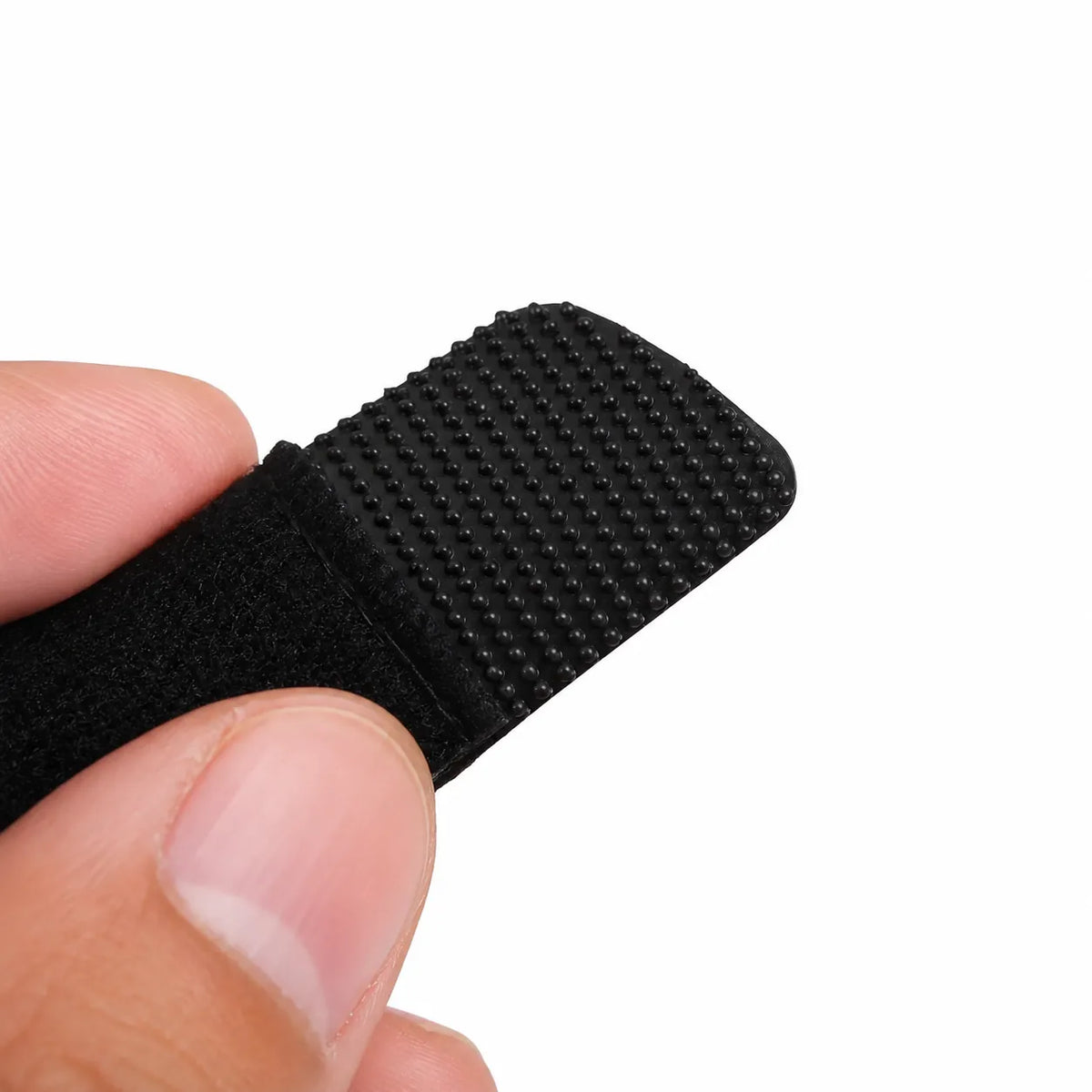 Närbild på halkfri detalj på justerbar fingerskena för lätt stöd och säker passform.