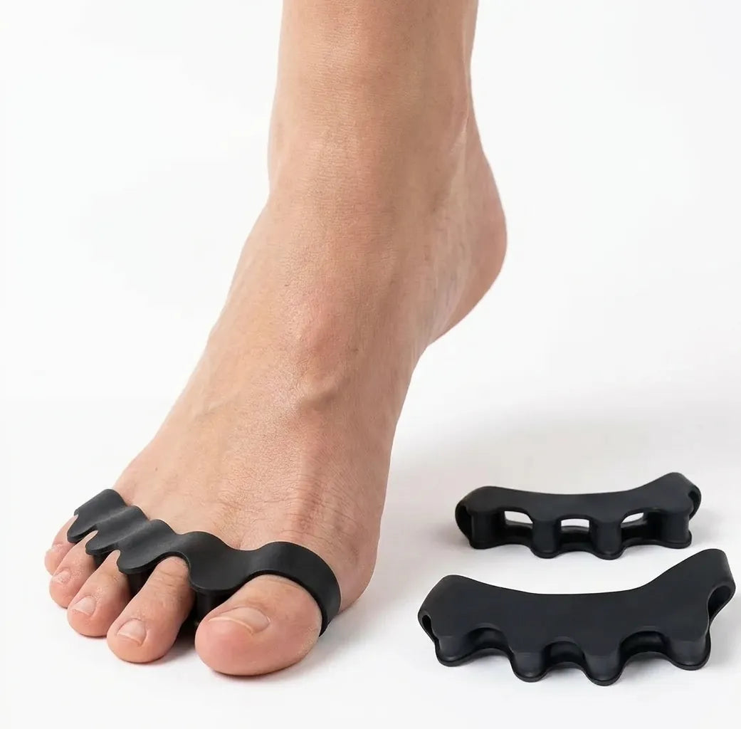 Tåseparerare mot hallux valgus som håller tårna åtskilda